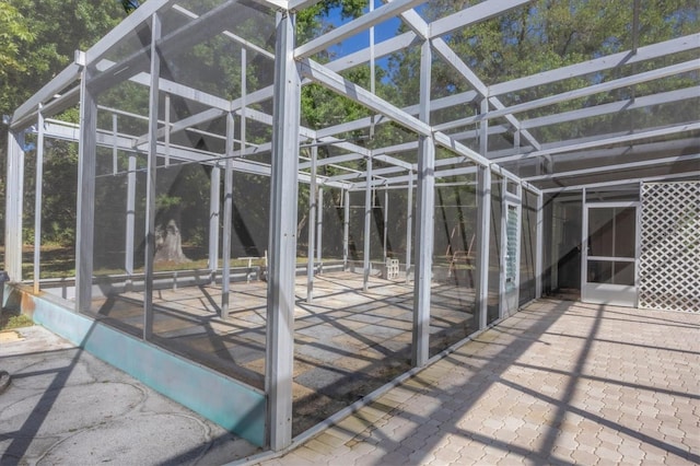 view of patio / terrace with glass enclosure