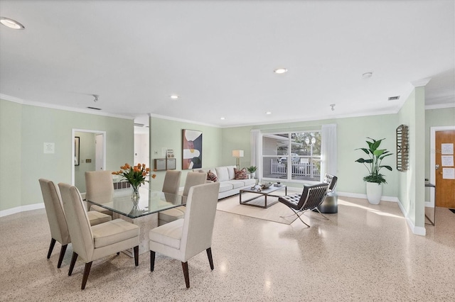 dining room featuring ornamental molding