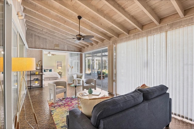 sunroom featuring lofted ceiling with beams and wooden ceiling