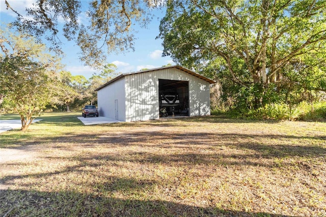 view of outdoor structure featuring a yard