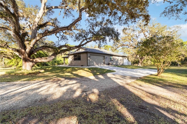 view of side of property with a yard