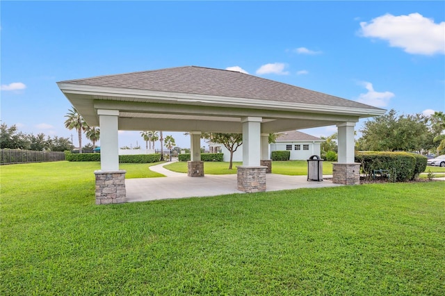 view of property's community with a gazebo and a lawn