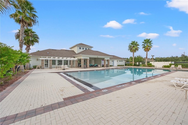 view of pool featuring a patio