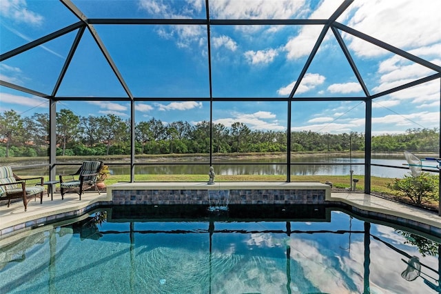 view of swimming pool with a lanai, a water view, and a patio