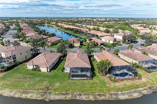 drone / aerial view featuring a water view