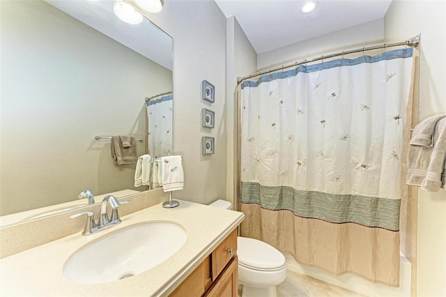 full bathroom with vanity, shower / bath combination with curtain, and toilet