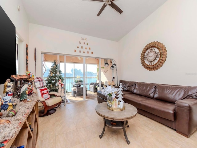 tiled living room featuring ceiling fan