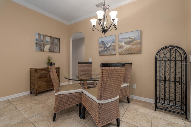 dining space featuring a notable chandelier, light tile patterned floors, and crown molding