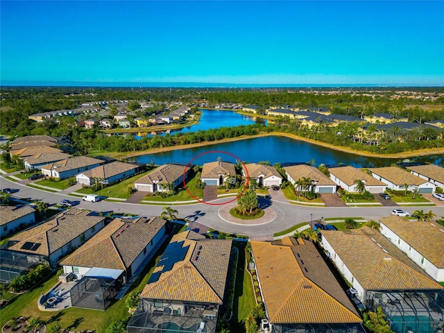 drone / aerial view with a water view