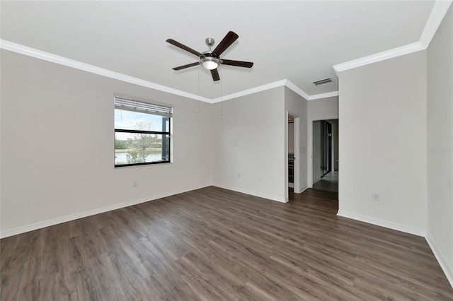 empty room featuring ceiling fan, ornamental molding, and dark hardwood / wood-style flooring