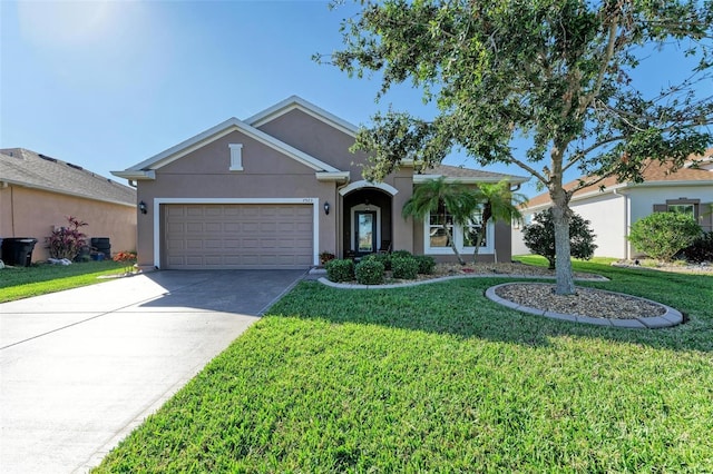 single story home featuring a front yard and a garage