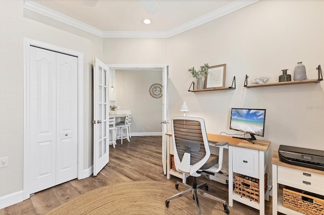 office area featuring hardwood / wood-style flooring and ornamental molding