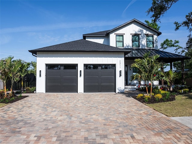 modern farmhouse style home with a garage