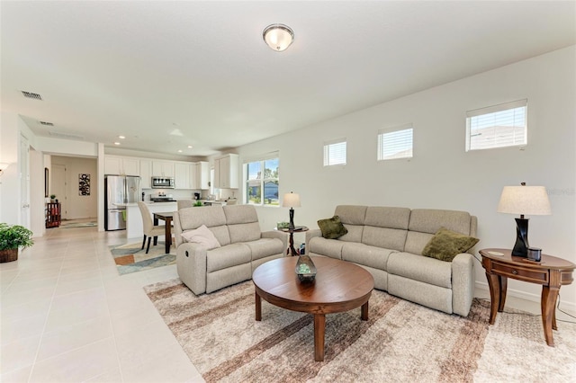 living room featuring light tile patterned flooring