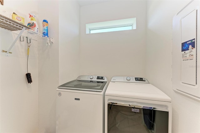 laundry area with washer and clothes dryer