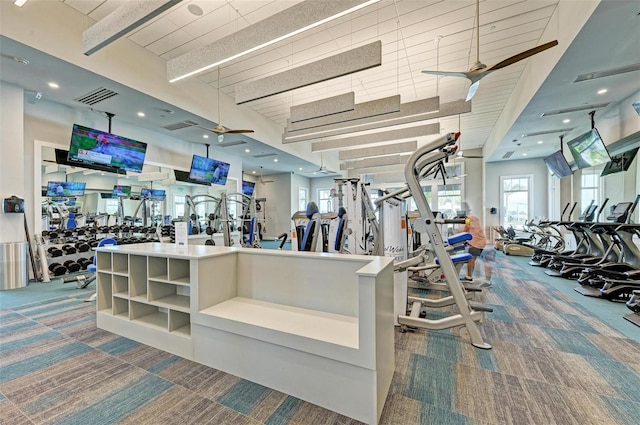 exercise room featuring carpet flooring and ceiling fan