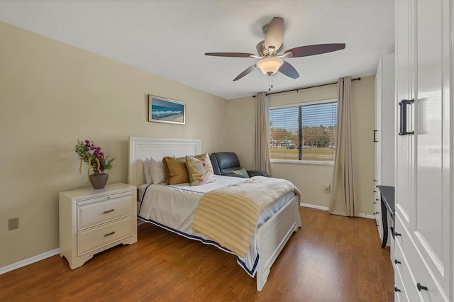 bedroom featuring ceiling fan and wood-type flooring