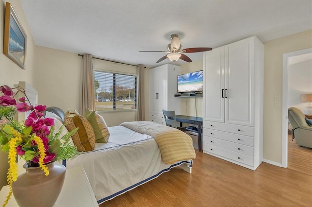 bedroom featuring ceiling fan and light wood-type flooring