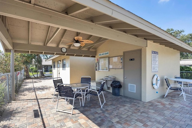 view of patio / terrace featuring ceiling fan