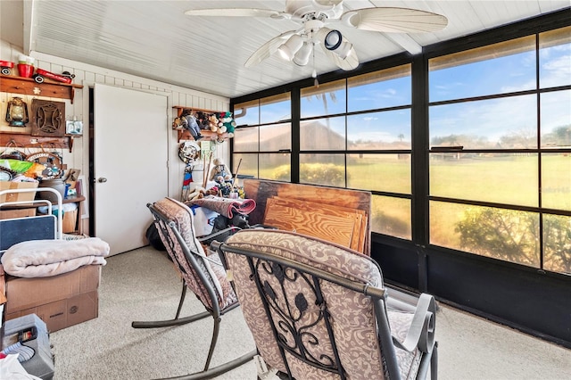 sunroom / solarium with ceiling fan