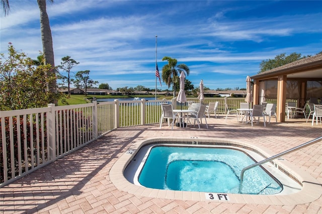 view of swimming pool featuring a patio