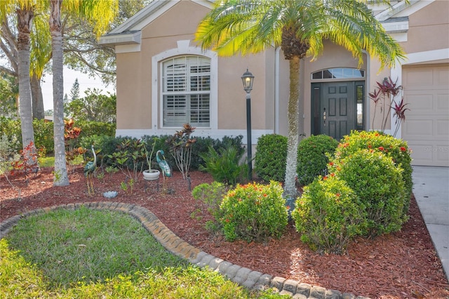 property entrance featuring a garage