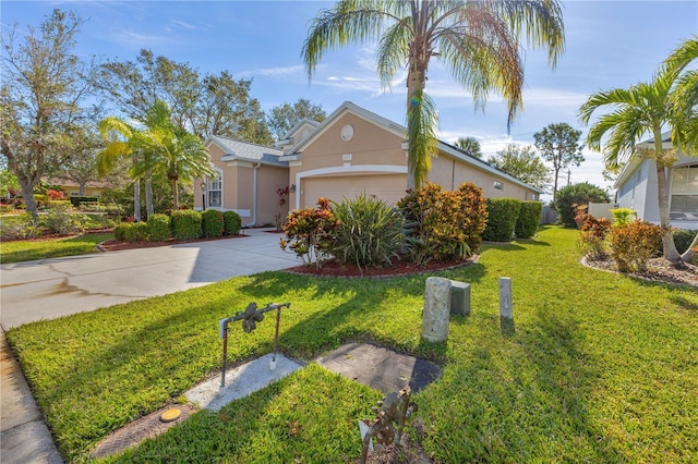 single story home featuring a front lawn and a garage