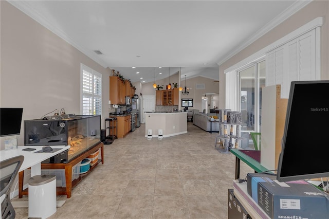 living room with a notable chandelier, lofted ceiling, and crown molding