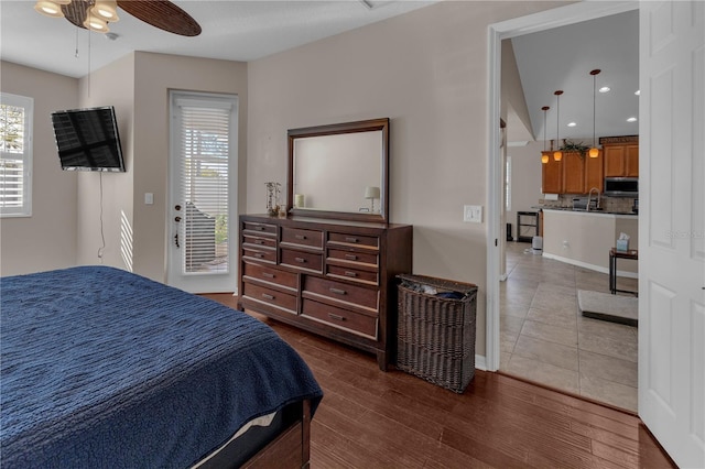 bedroom with hardwood / wood-style floors and ceiling fan