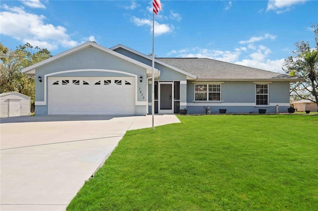 single story home featuring a front yard and a garage