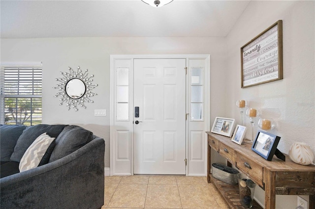 foyer entrance featuring light tile patterned floors