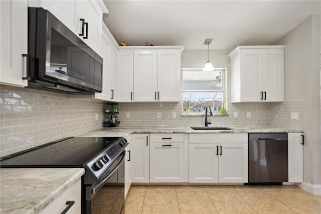 kitchen with backsplash, sink, dishwasher, black electric range, and white cabinetry