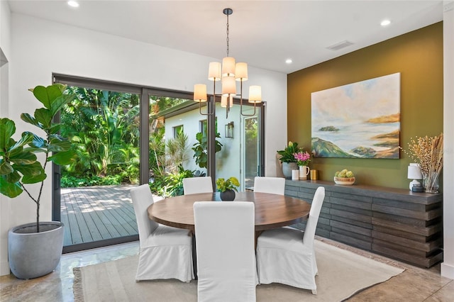 dining area with a notable chandelier