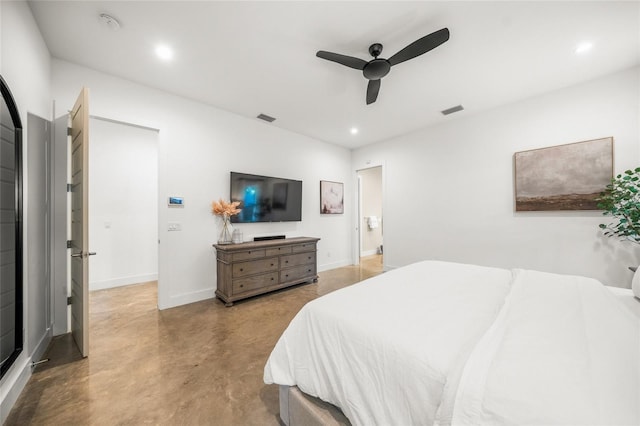 bedroom with ceiling fan and concrete floors