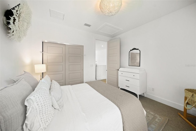 bedroom with carpet and a closet