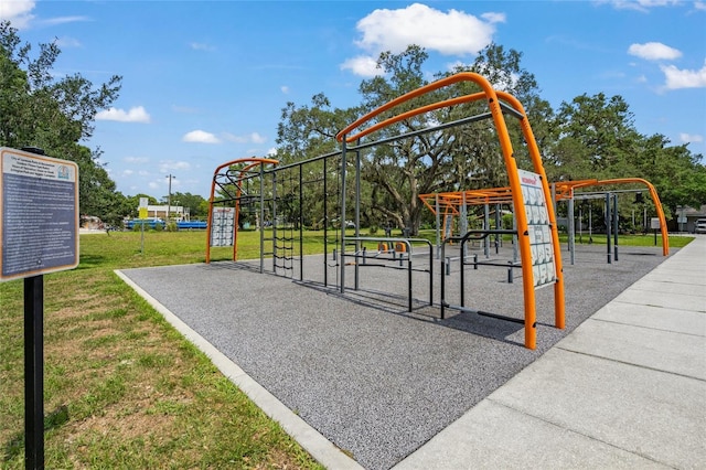 view of home's community with a yard and a playground