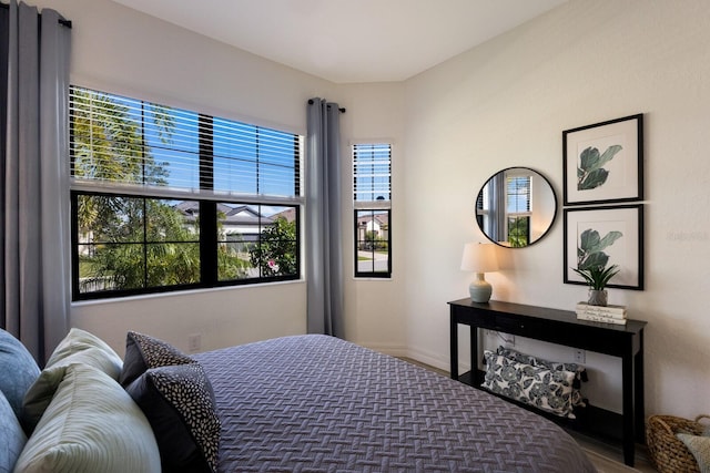 bedroom featuring hardwood / wood-style flooring