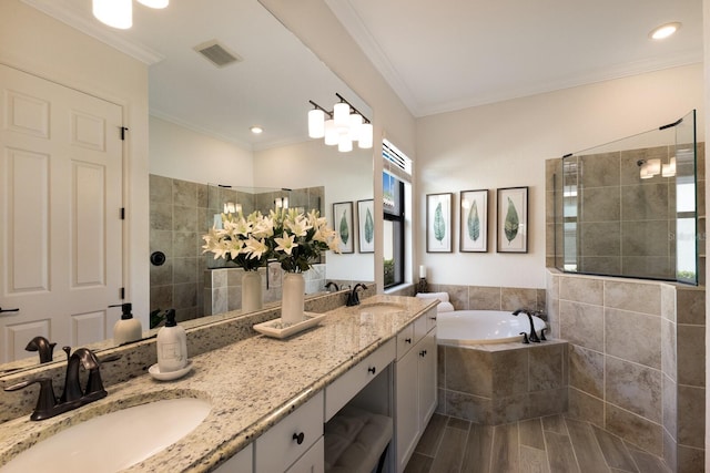 bathroom featuring shower with separate bathtub, vanity, and ornamental molding