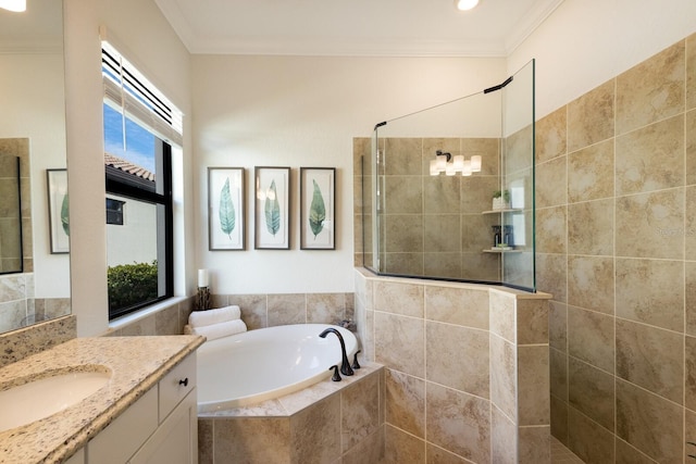 bathroom with vanity, shower with separate bathtub, and ornamental molding