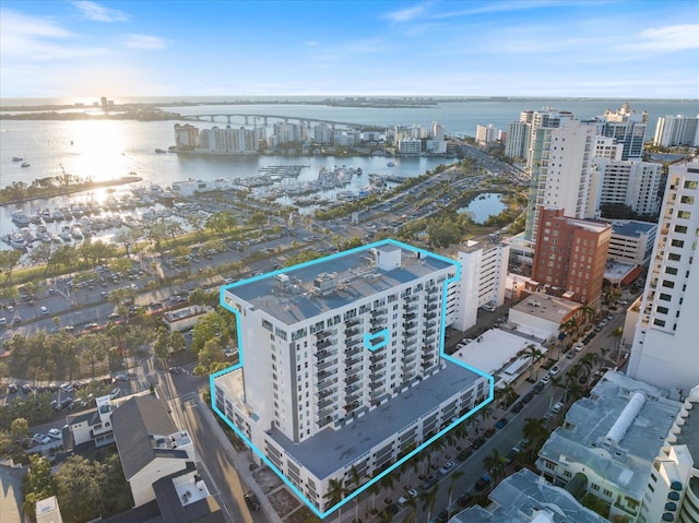 birds eye view of property featuring a water view