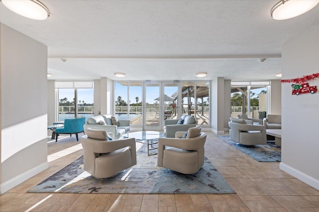 living room with a textured ceiling