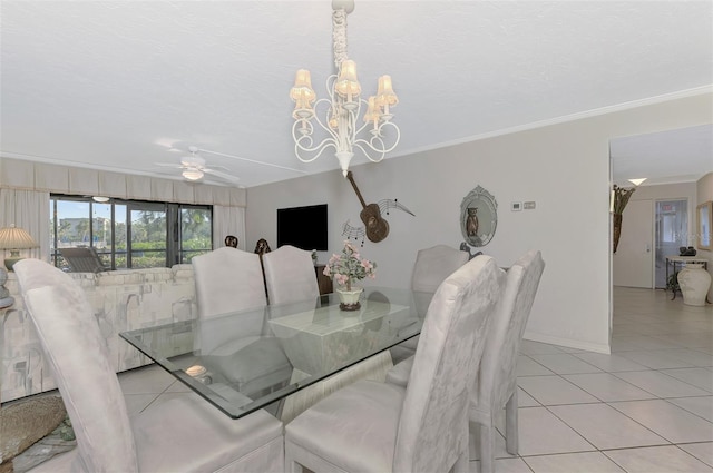 tiled dining space with ceiling fan with notable chandelier and ornamental molding