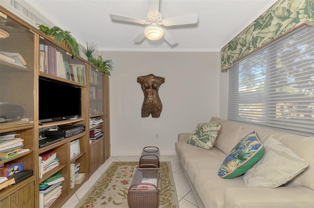 tiled living room with crown molding and ceiling fan