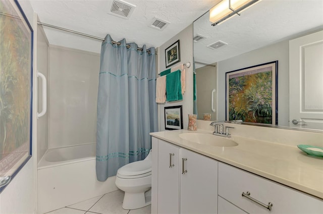 full bathroom featuring tile patterned flooring, a textured ceiling, toilet, shower / bath combo with shower curtain, and vanity