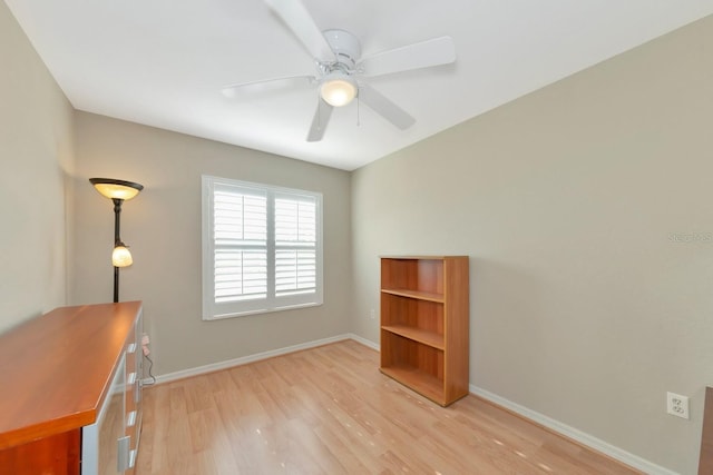 interior space with ceiling fan and light hardwood / wood-style floors