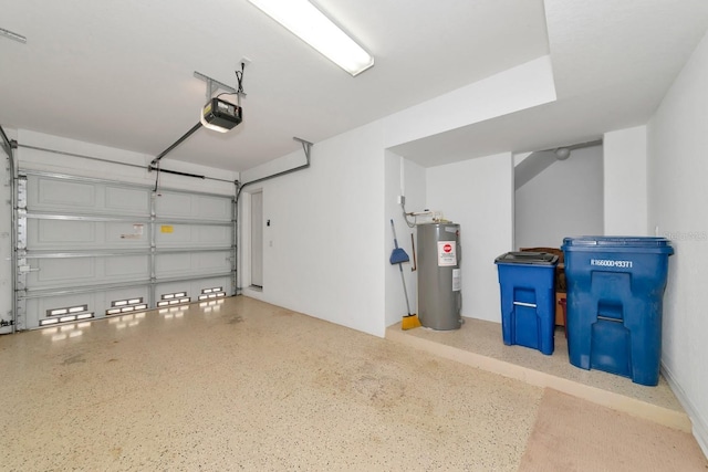 garage featuring water heater and a garage door opener