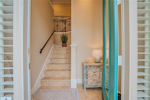 stairway with tile patterned flooring