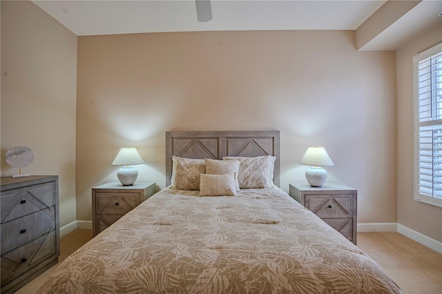 bedroom featuring ceiling fan and carpet flooring