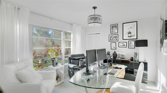 office area with hardwood / wood-style floors