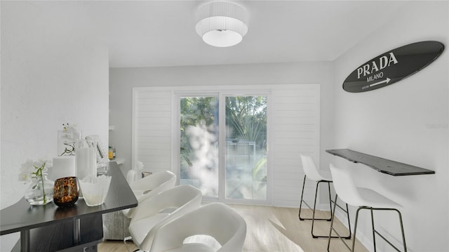 dining area with light hardwood / wood-style floors